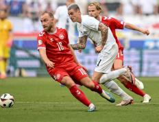 IM体育平台-丹麦队鏖战德国队，安赛龙统治全场